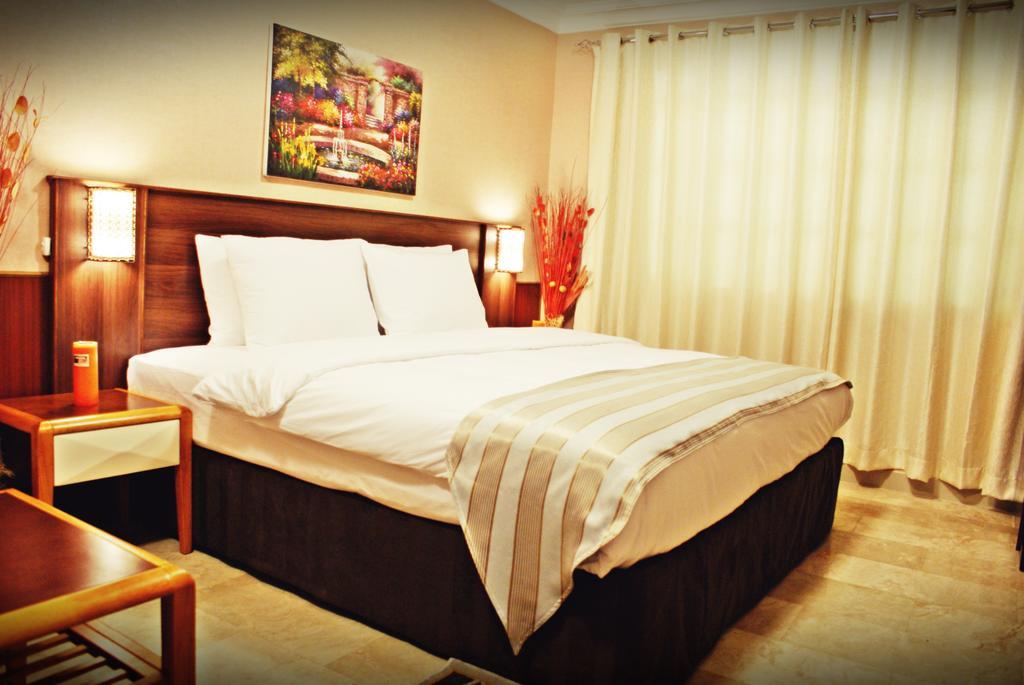 Weekend Hotel & Apartments Маскат Экстерьер фото